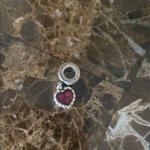 Pandora pink heart silver charm logo